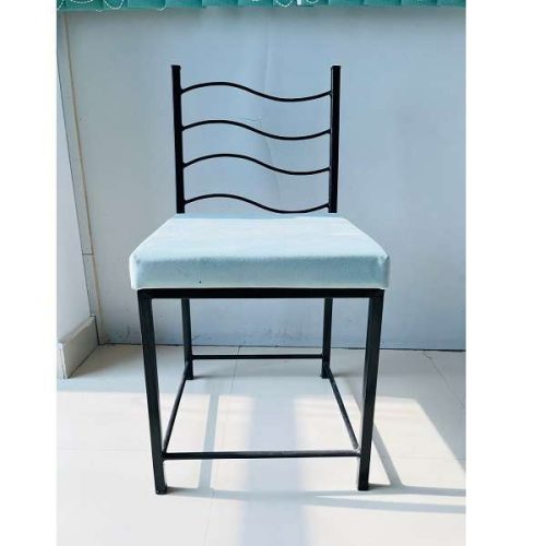 iron chair in black with blue cushion