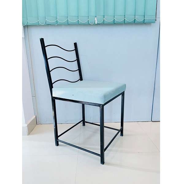 iron chair with blue cushion
