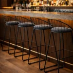 Orbit black metal bar stool, seating for bars and kitchen counters