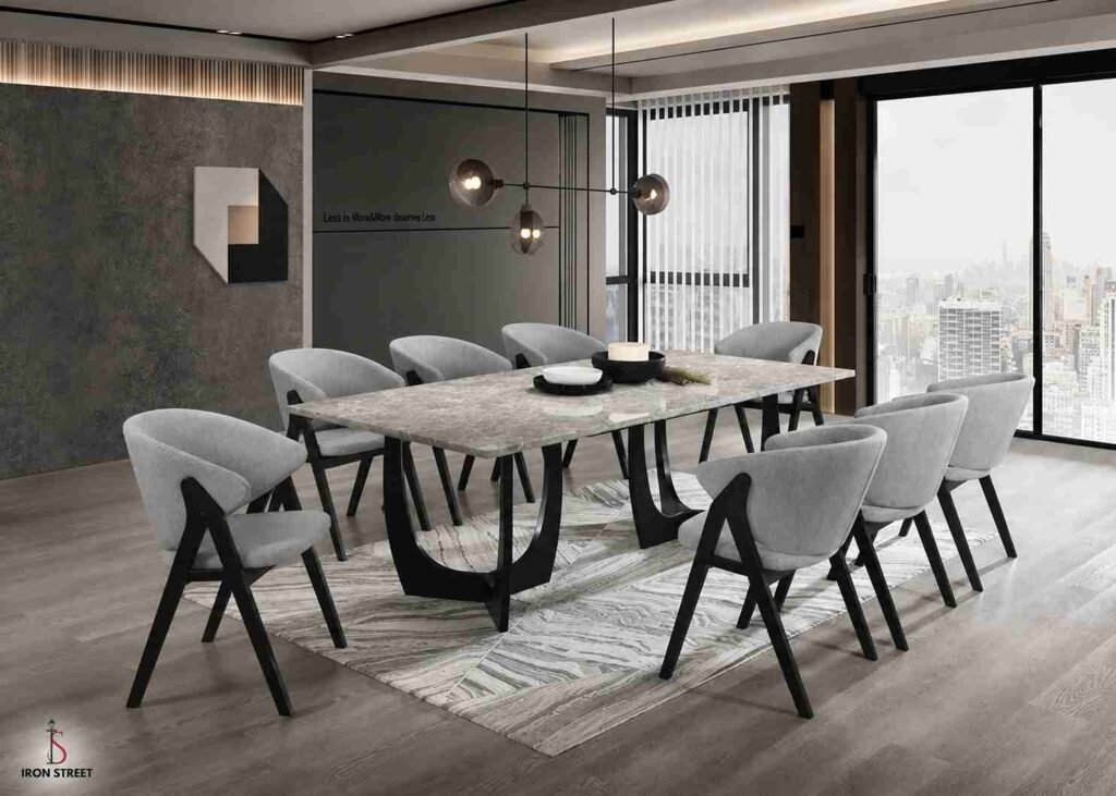 Grey marble dining table design with modern chairs for a sophisticated dining room